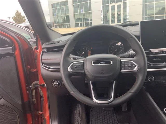 Used 2025 Red Hot Pearlcoat Jeep Trailhawk 4x4 image 20