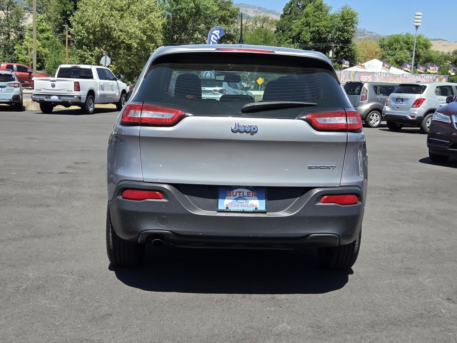 Used 2016 Billet Silver Metallic Clearcoat Jeep Sport image 6