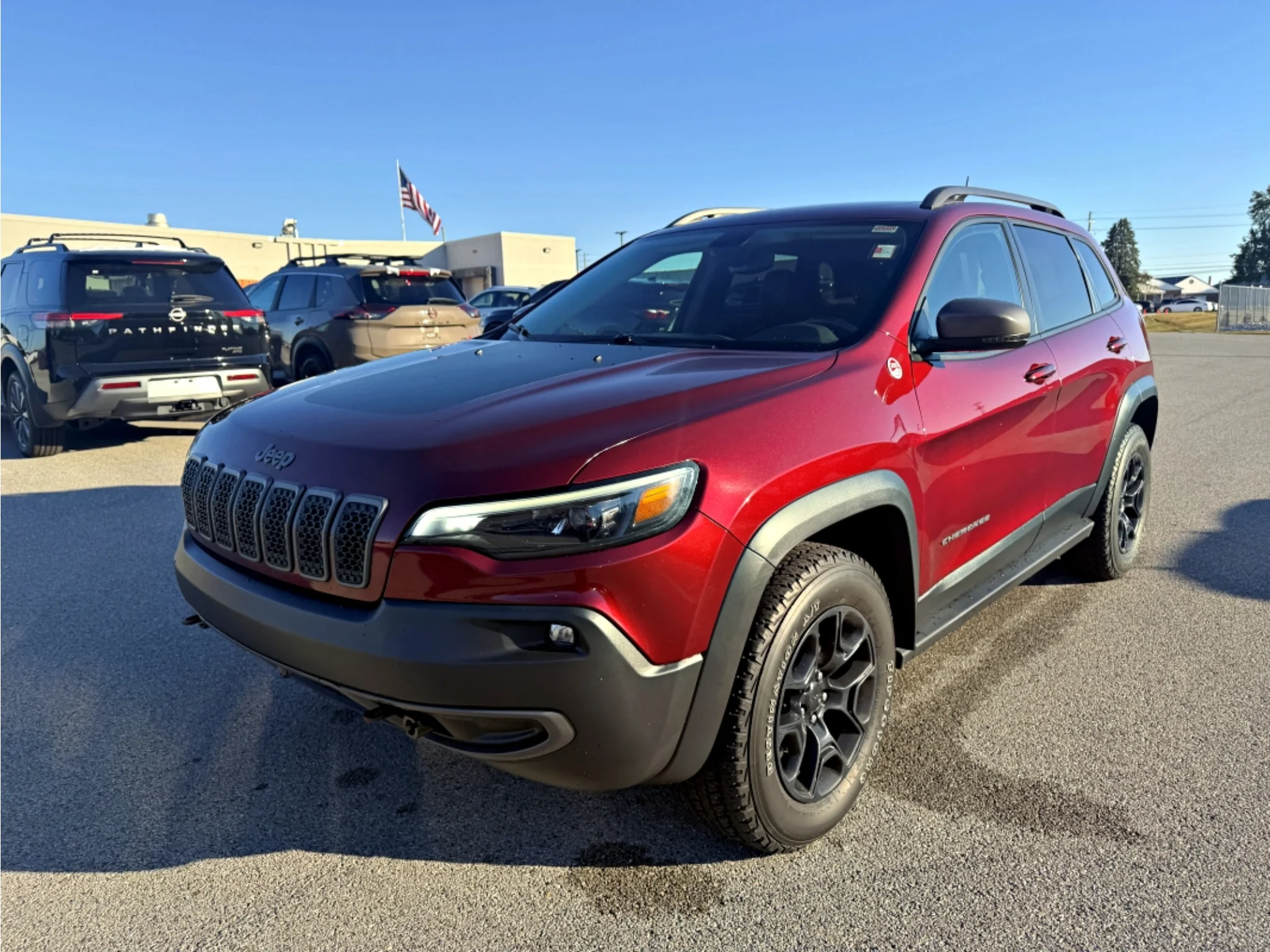 Used 2020 Velvet Red Pearlcoat Jeep Trailhawk image 1