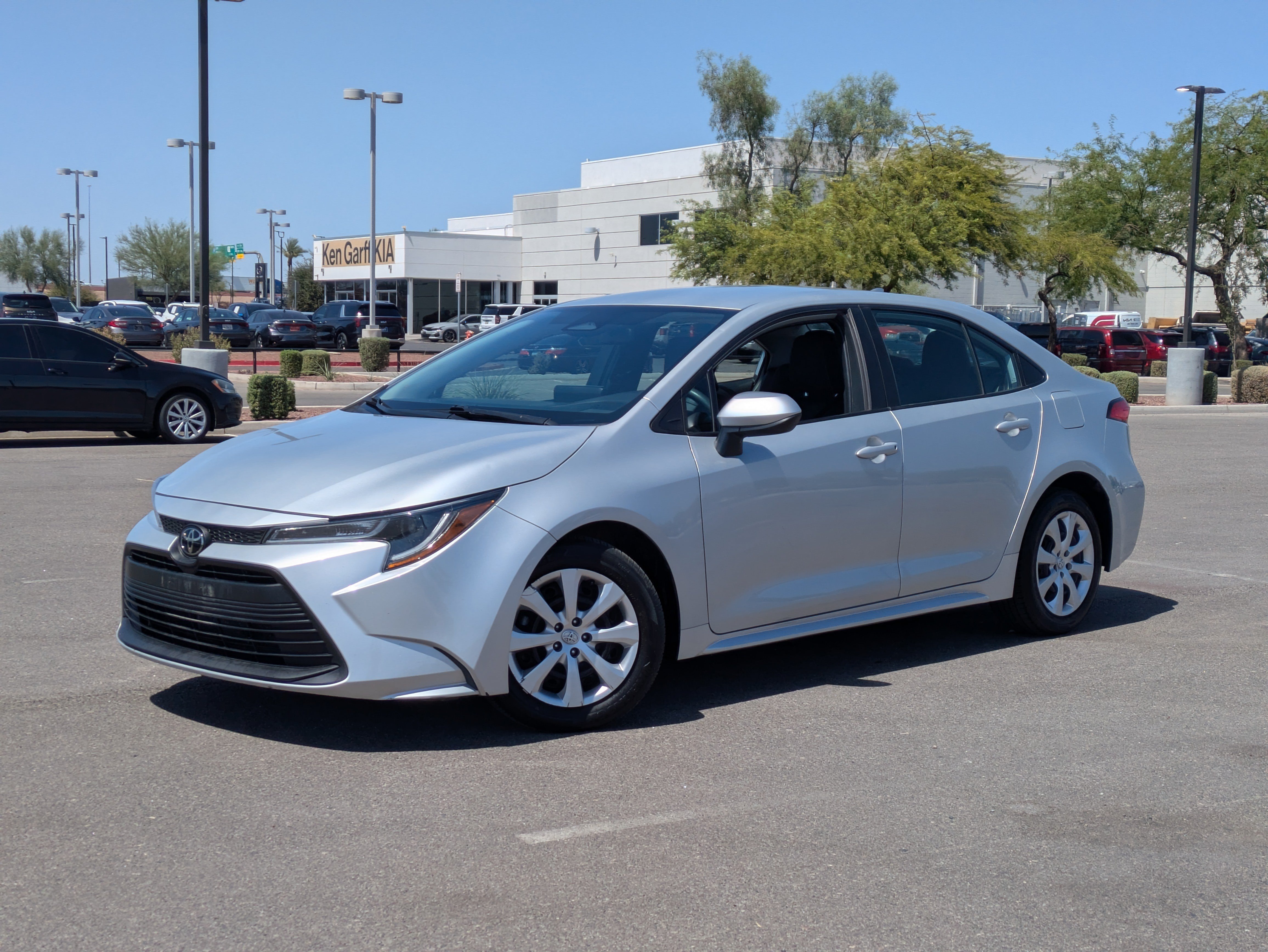 Used 2024 Classic Silver Metallic Toyota LE image 31
