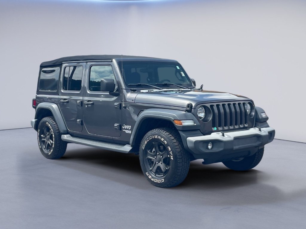 Used 2018 Granite Crystal Metallic Clearcoat Jeep Sport S image 1
