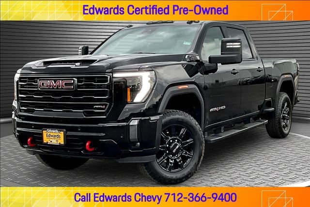 Used 2024 Black GMC AT4 image 1