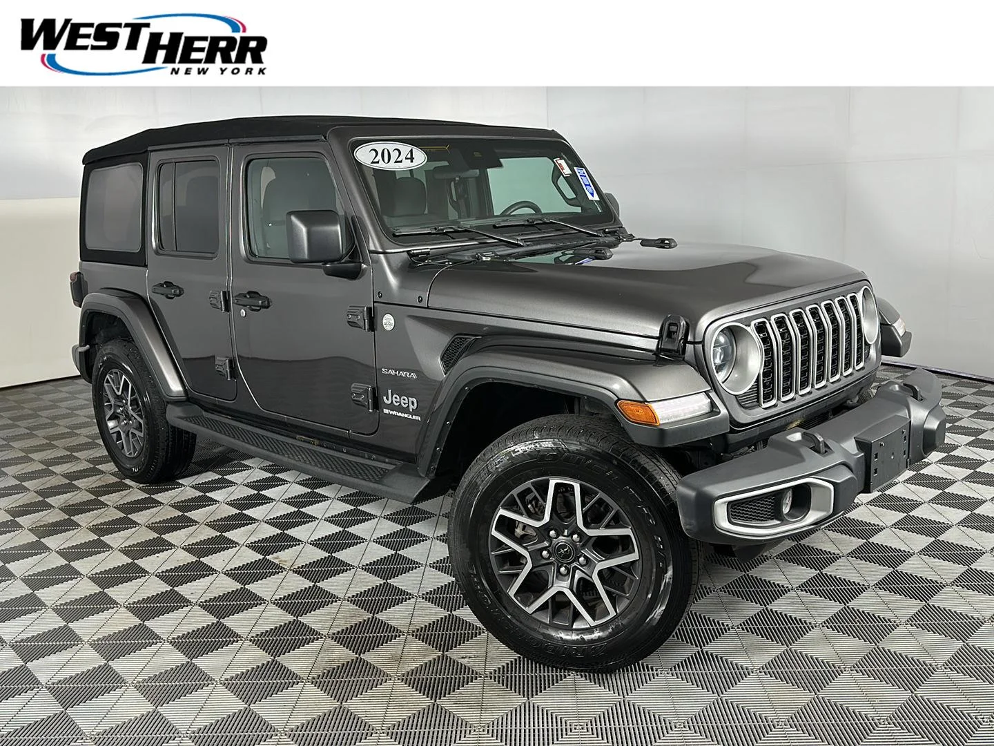 Used 2024 Granite Crystal Metallic Clearcoat Jeep Sahara image 1
