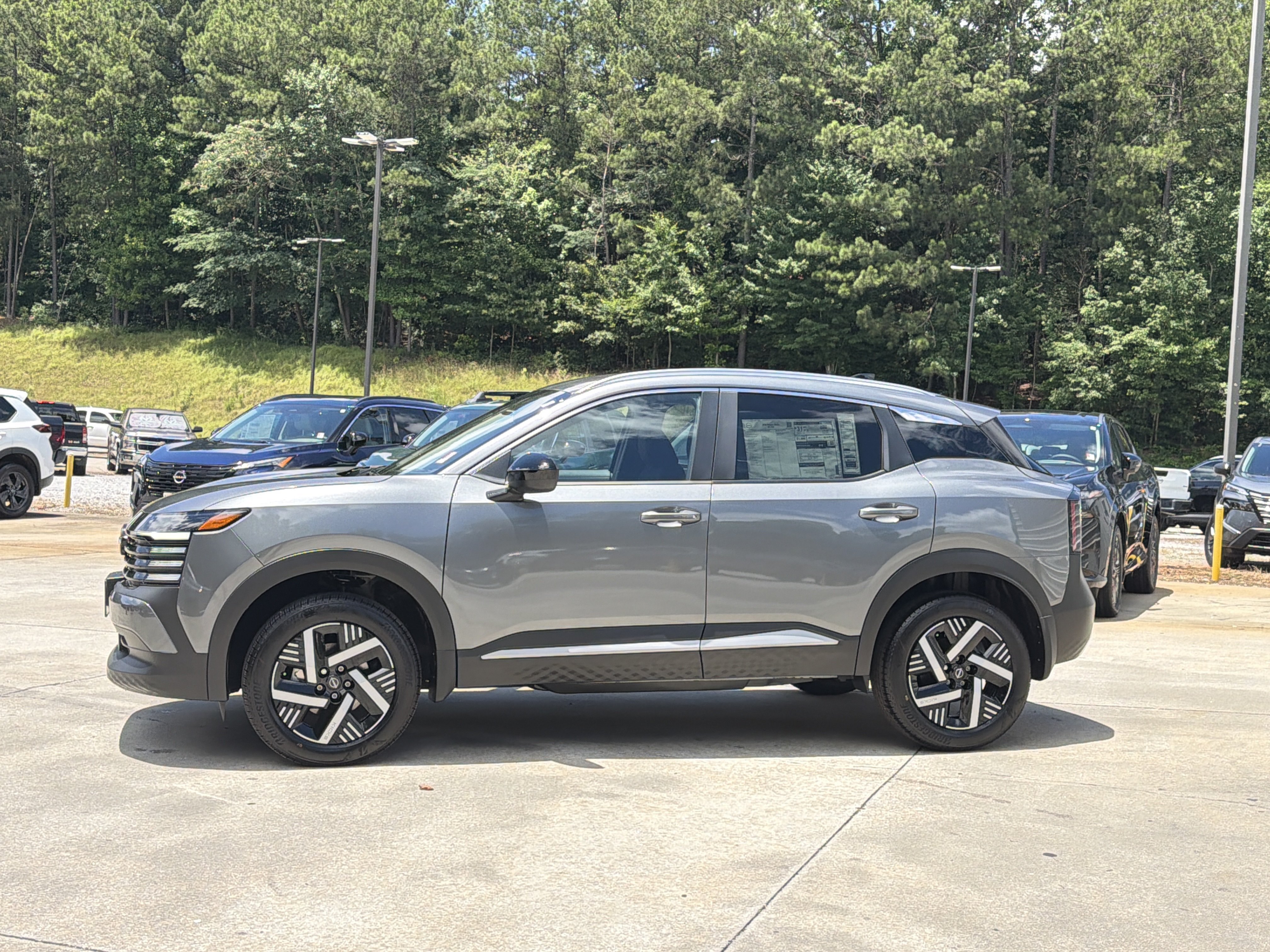 New 2026 Gun Metallic Nissan SV image 5
