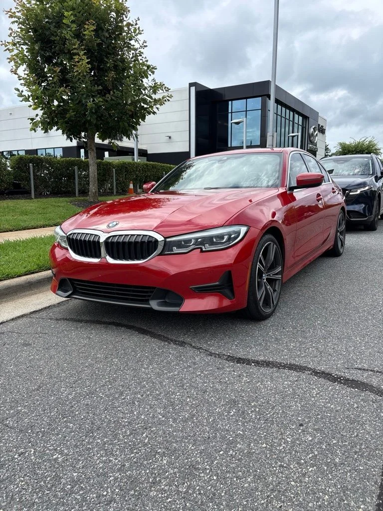 Used 2021 Melbourne Red Metallic BMW 330i image 1