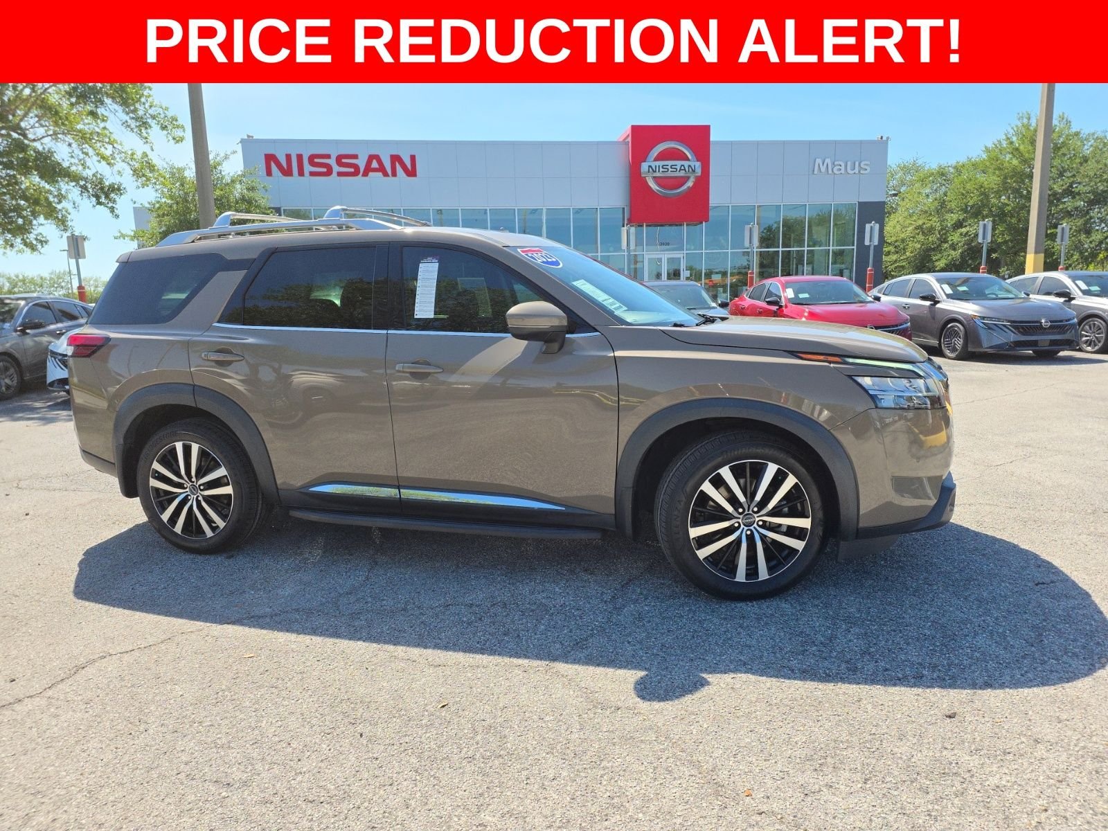 Certified Used 2023 Beige Nissan Platinum image 1