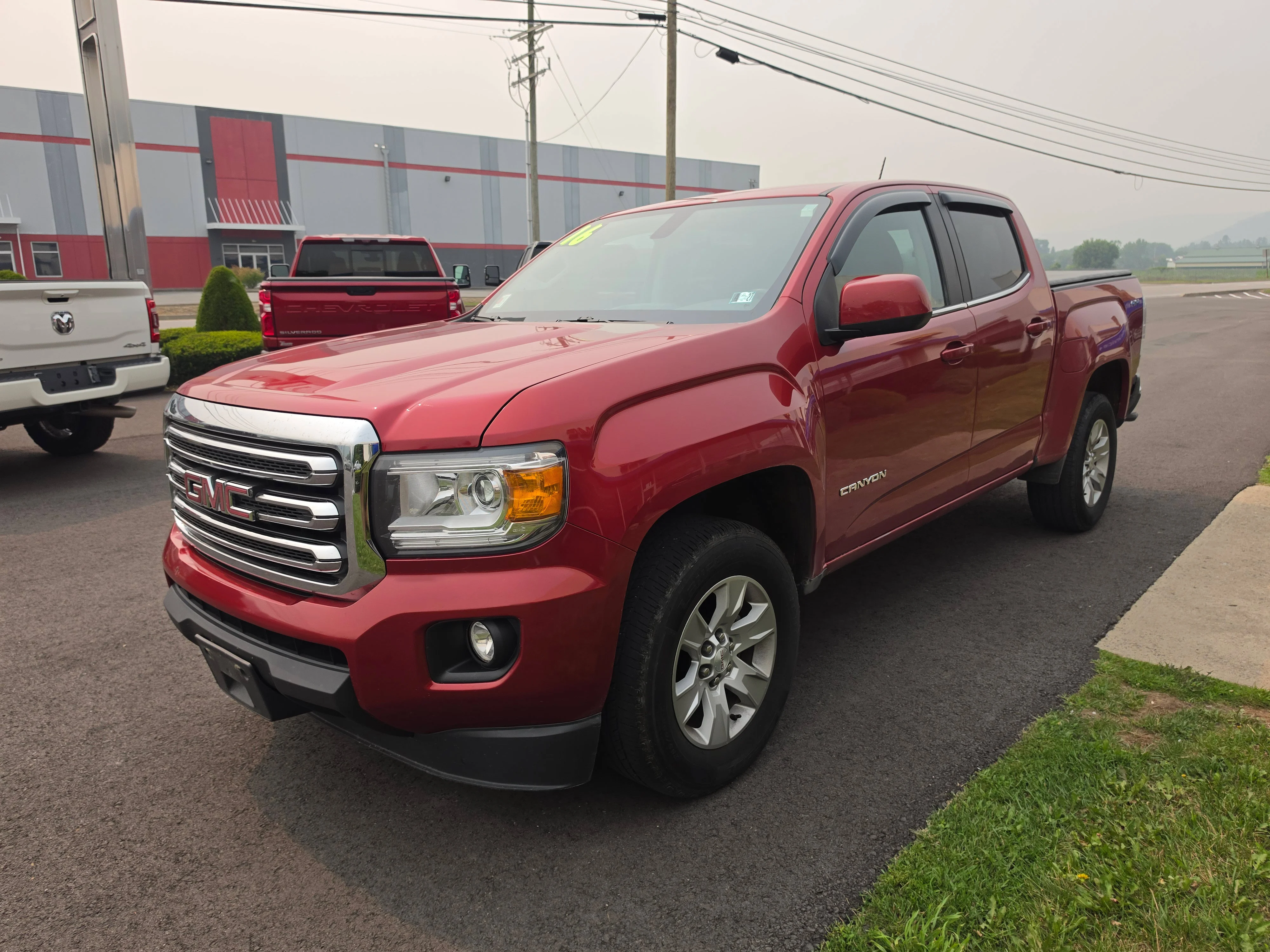 Used 2016 Copper Red Metallic GMC 4WD SLE image 8