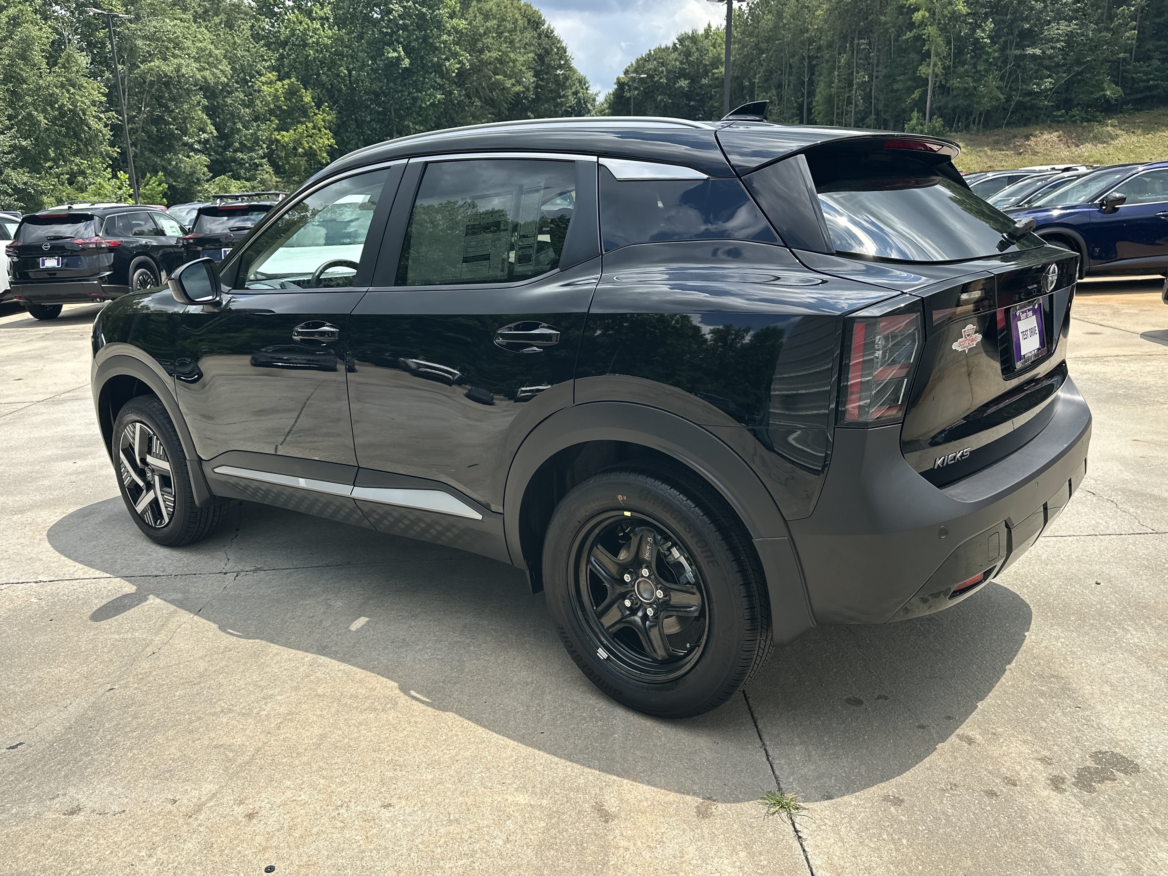New 2026 Super Black Nissan SV image 6