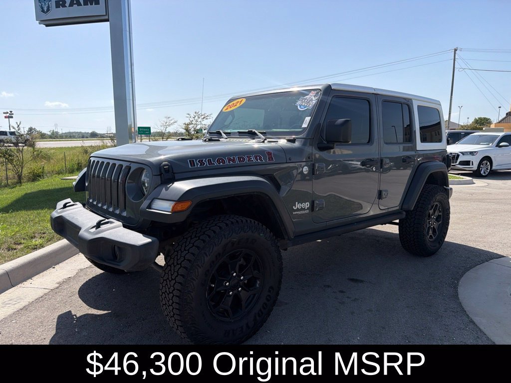 Used 2021 Gray Jeep Unlimited Sport image 1