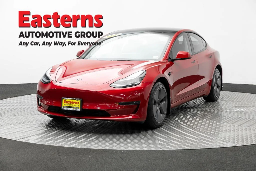 Used 2022 Red Tesla Base image 1