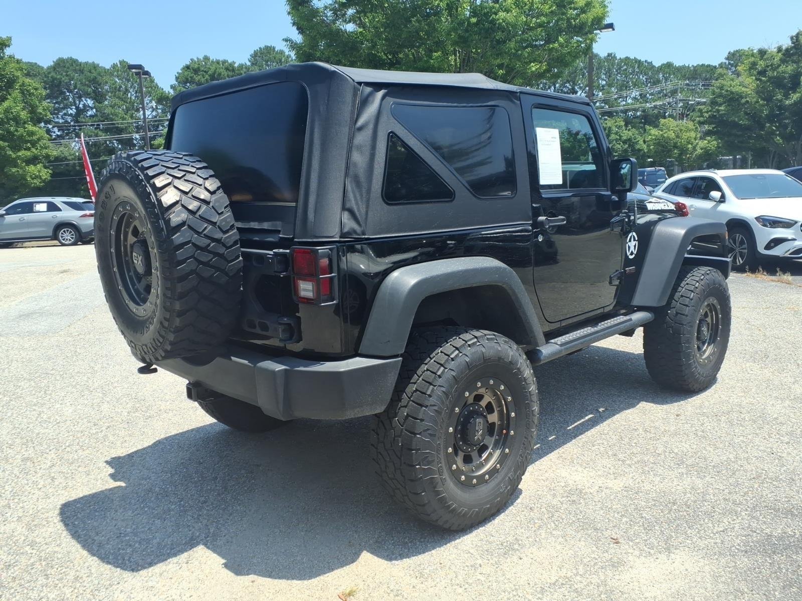 Used 2017 Black Clearcoat Jeep Sport image 6