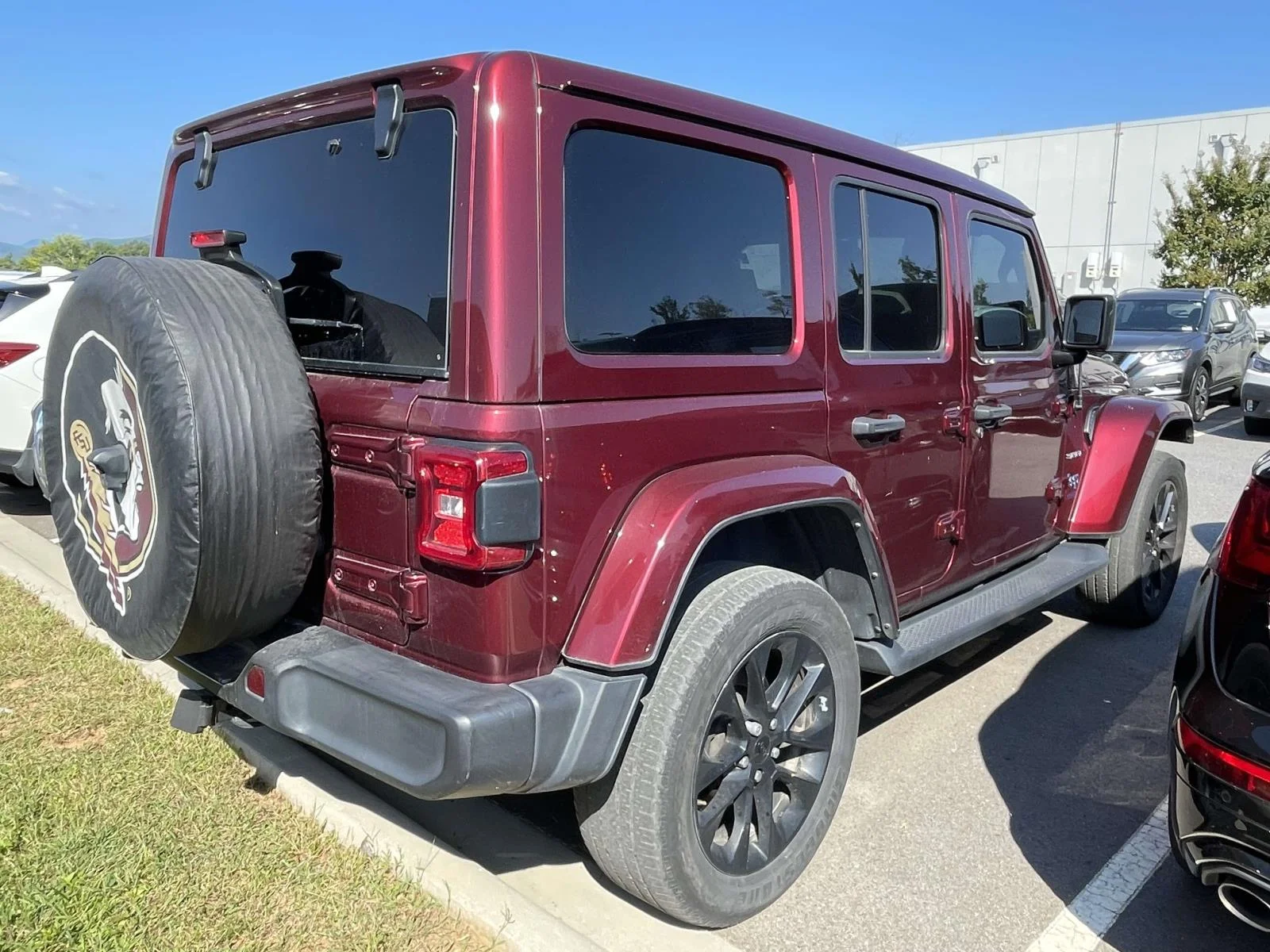 Used 2021 Snazzberry Pearlcoat Jeep Unlimited Sahara image 4