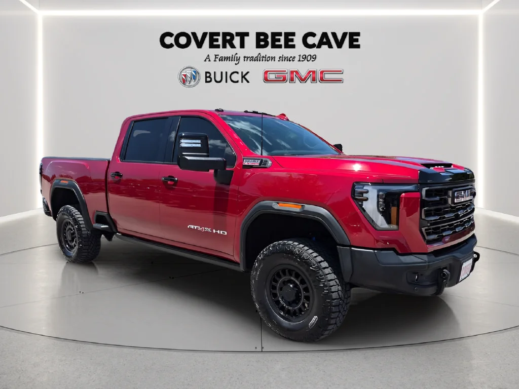 Used 2025 Volcanic Red Tintcoat GMC AT4X image 1