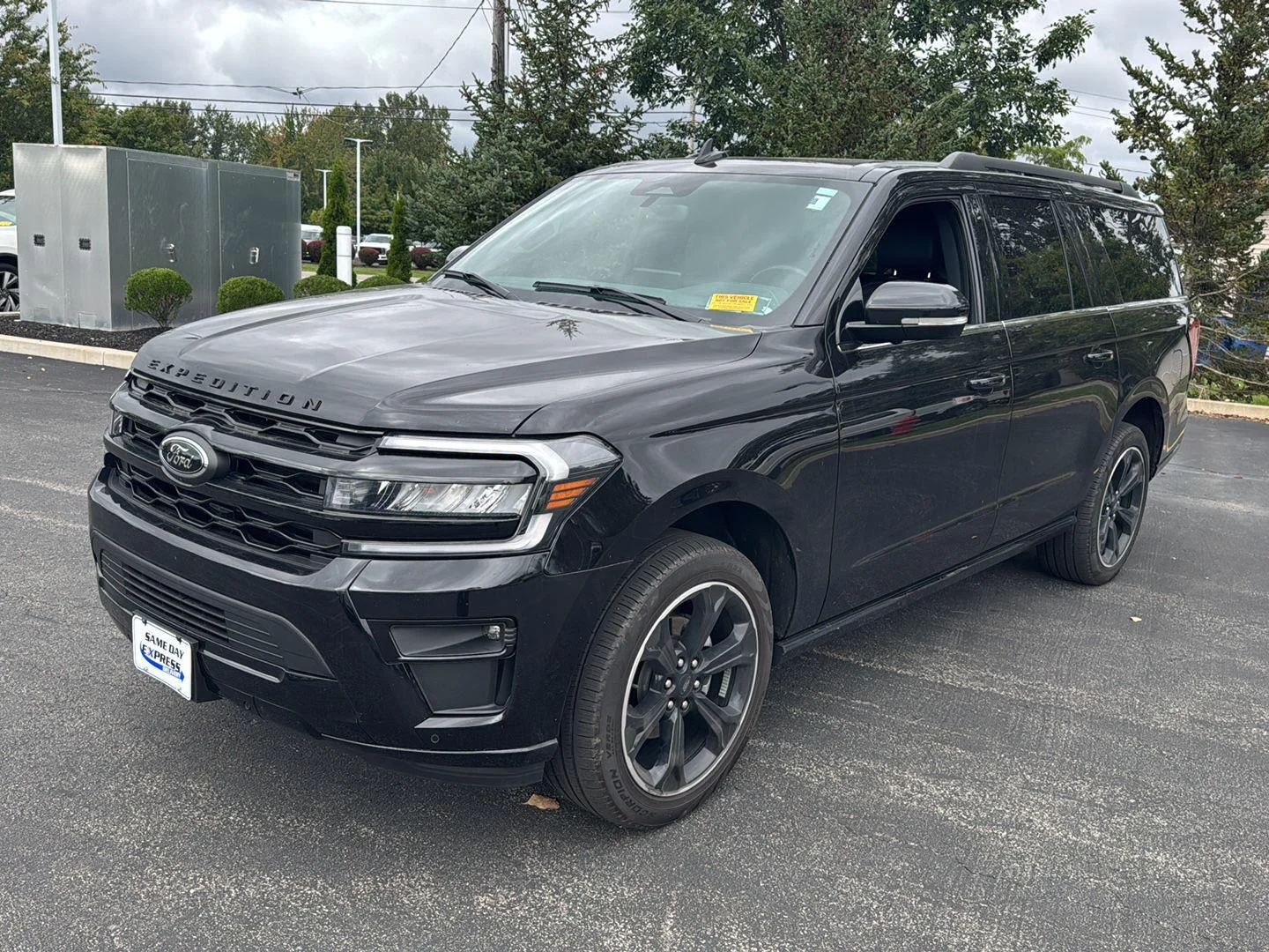 Used 2024 Agate Black Metallic Ford Limited image 2