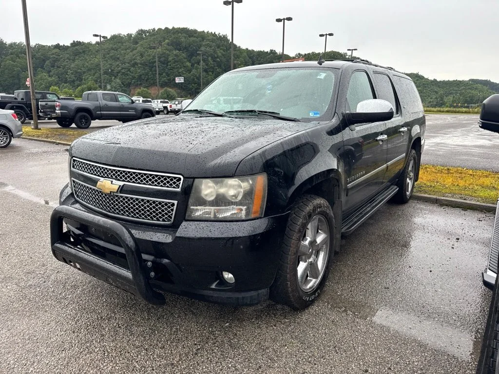 Used 2011 Black Chevrolet LTZ image 1