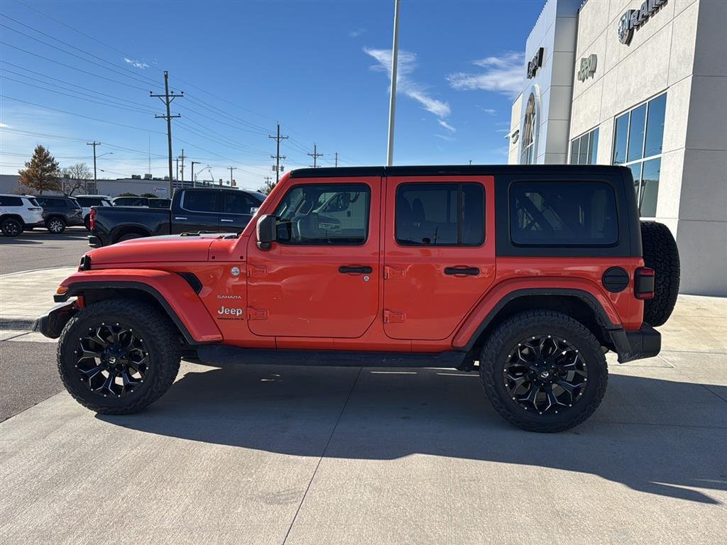 Used 2023 Orange Jeep Unlimited Sahara image 2
