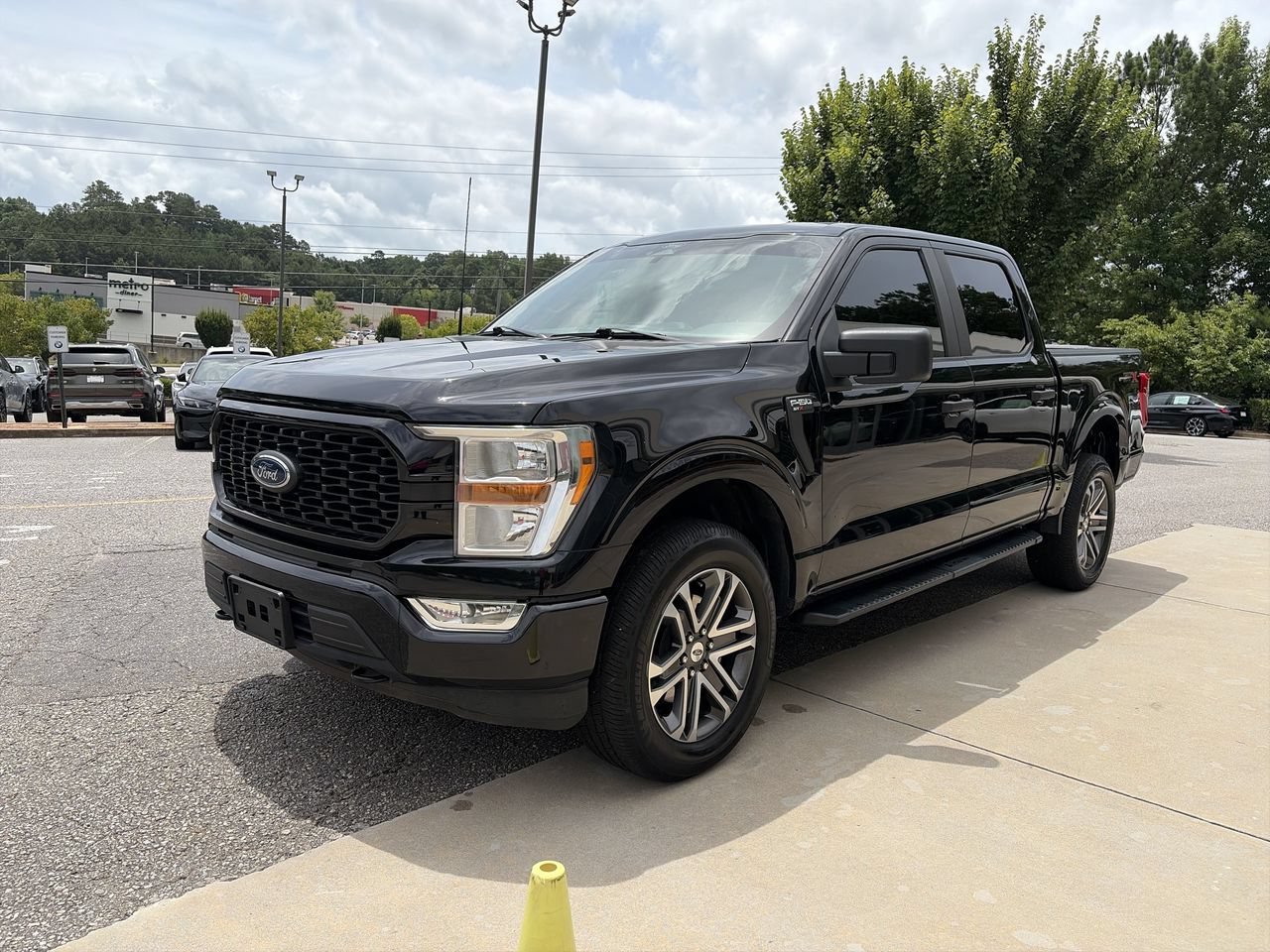 Used 2022 Agate Black Metallic Ford LARIAT image 4
