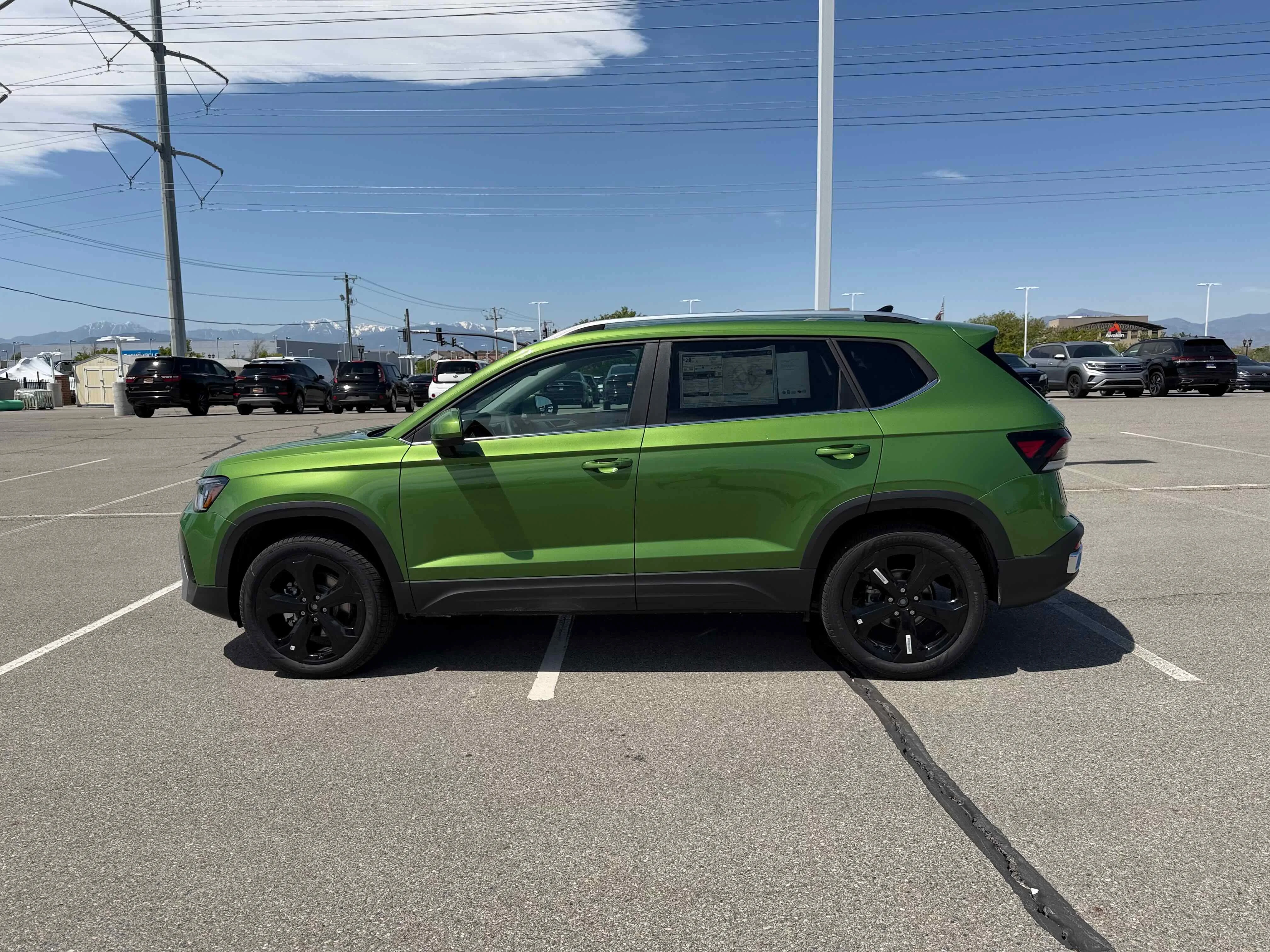 New 2026 Moss Green Volkswagen SEL image 2