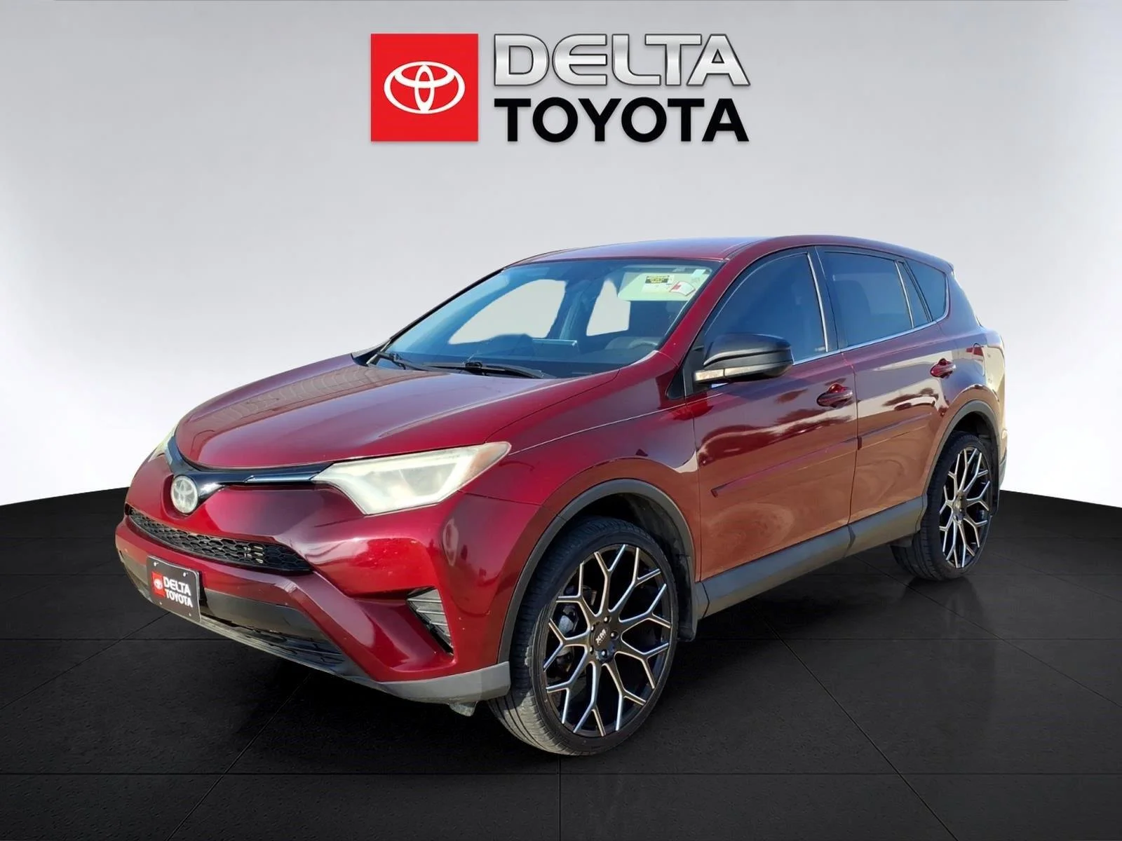 Used 2018 Ruby Flare Pearl Toyota LE image 1