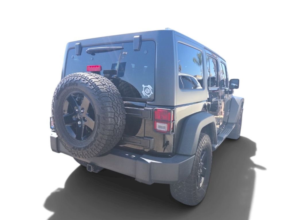 Used 2016 Black Jeep Unlimited Sport image 3