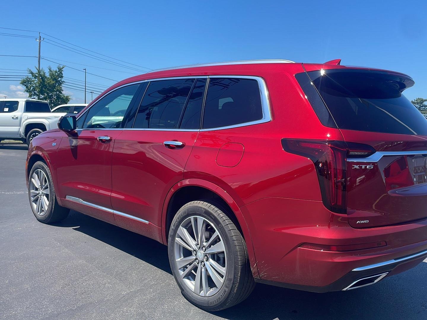 Used 2024 Radiant Red Tintcoat Cadillac AWD Premium Luxury image 7
