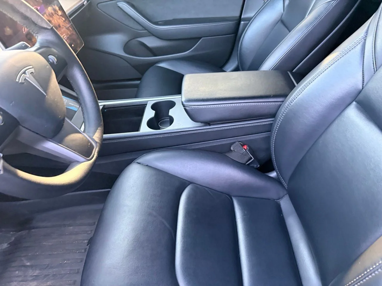 Used 2022 Solid Black Tesla Base image 9