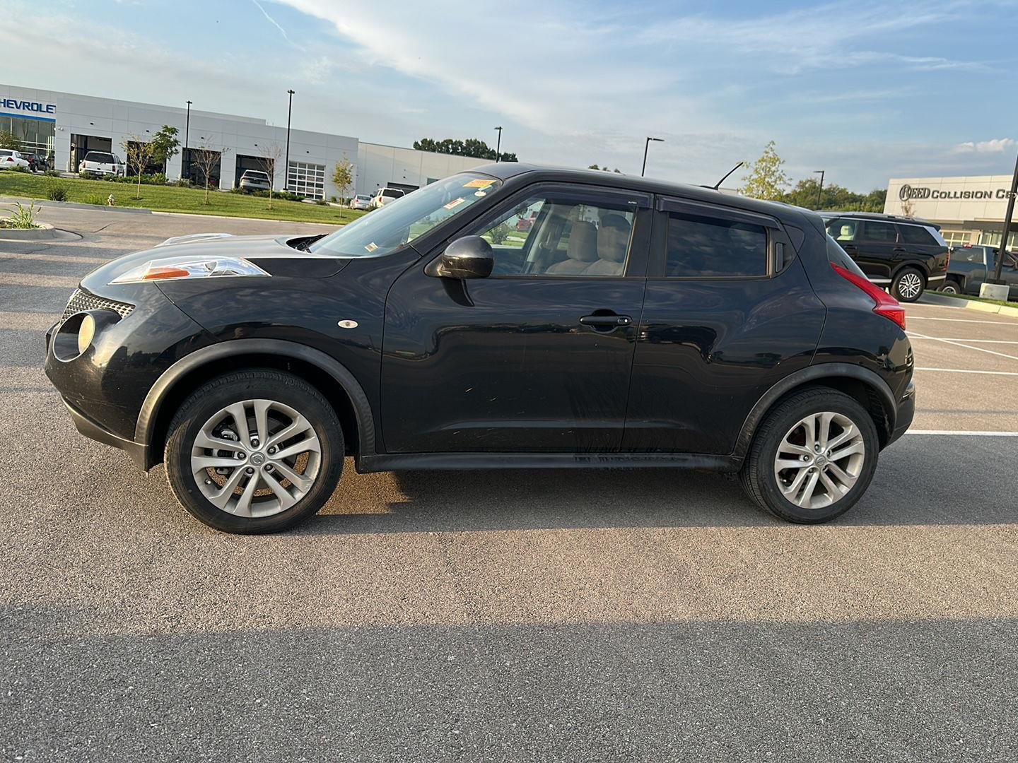 Used 2013 Graphite Blue Nissan SV image 3