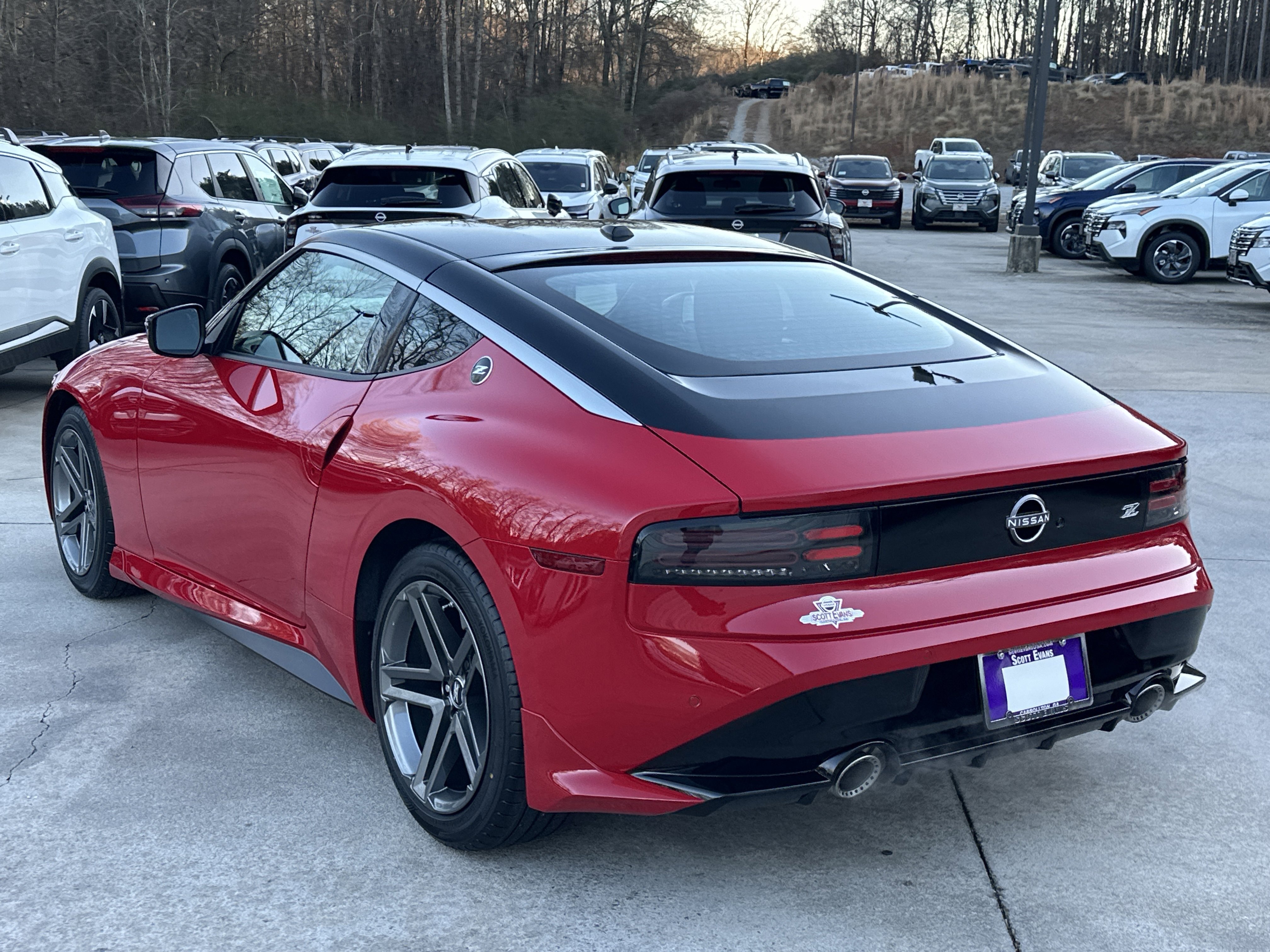 New 2026 Solid Red/Super Black Nissan Sport image 6