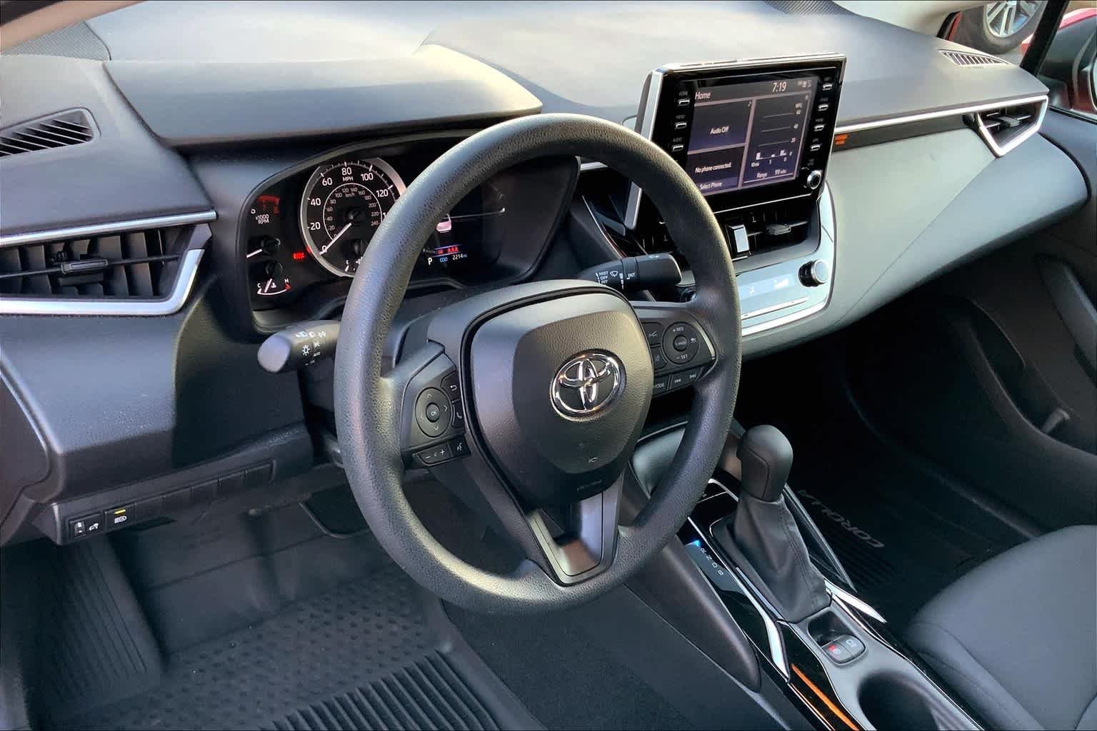 Used 2020 Barcelona Red Metallic Toyota LE image 18