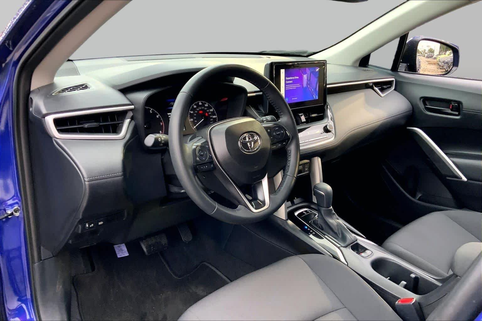 Used 2024 Blue Crush Metallic Toyota LE image 18