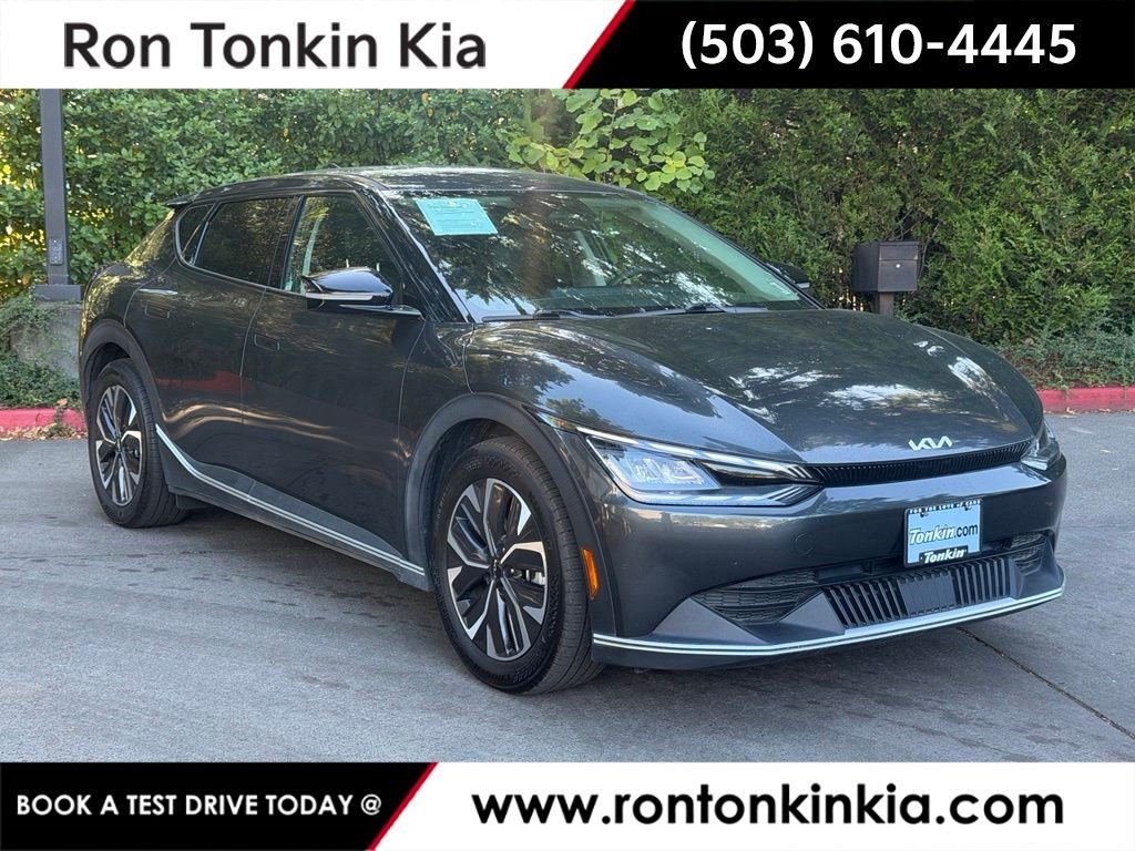 Used 2024 Interstellar Gray Kia Light image 1