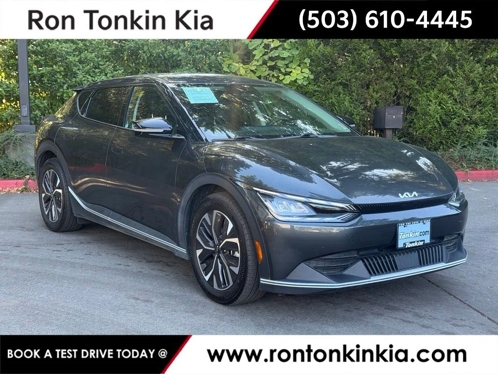Used 2024 Interstellar Gray Kia Light image 1