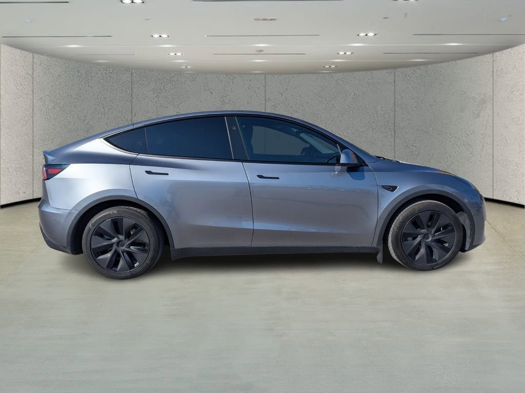 Used 2025 Tesla Model Y Long Range with VIN 7SAYGDED1SF253112 for sale in Kansas City