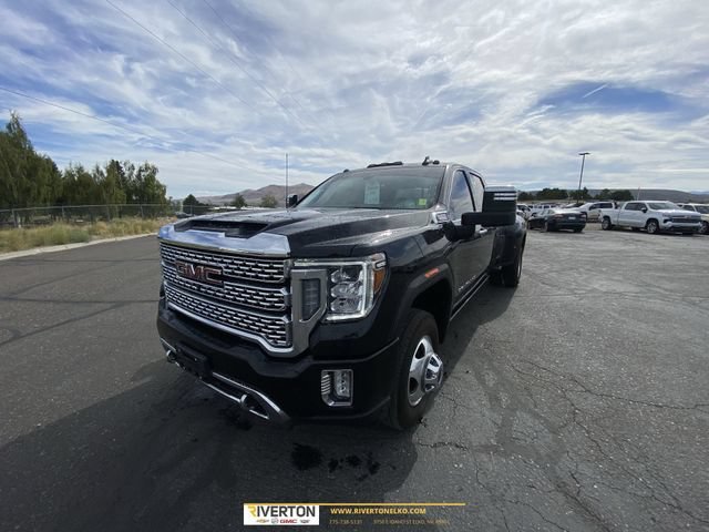 Used 2022 EBONY TWILIGHT METALLIC GMC Denali image 1
