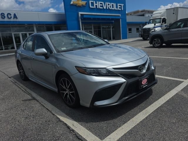 Used 2024 Celestial Silver Metallic Toyota SE image 1
