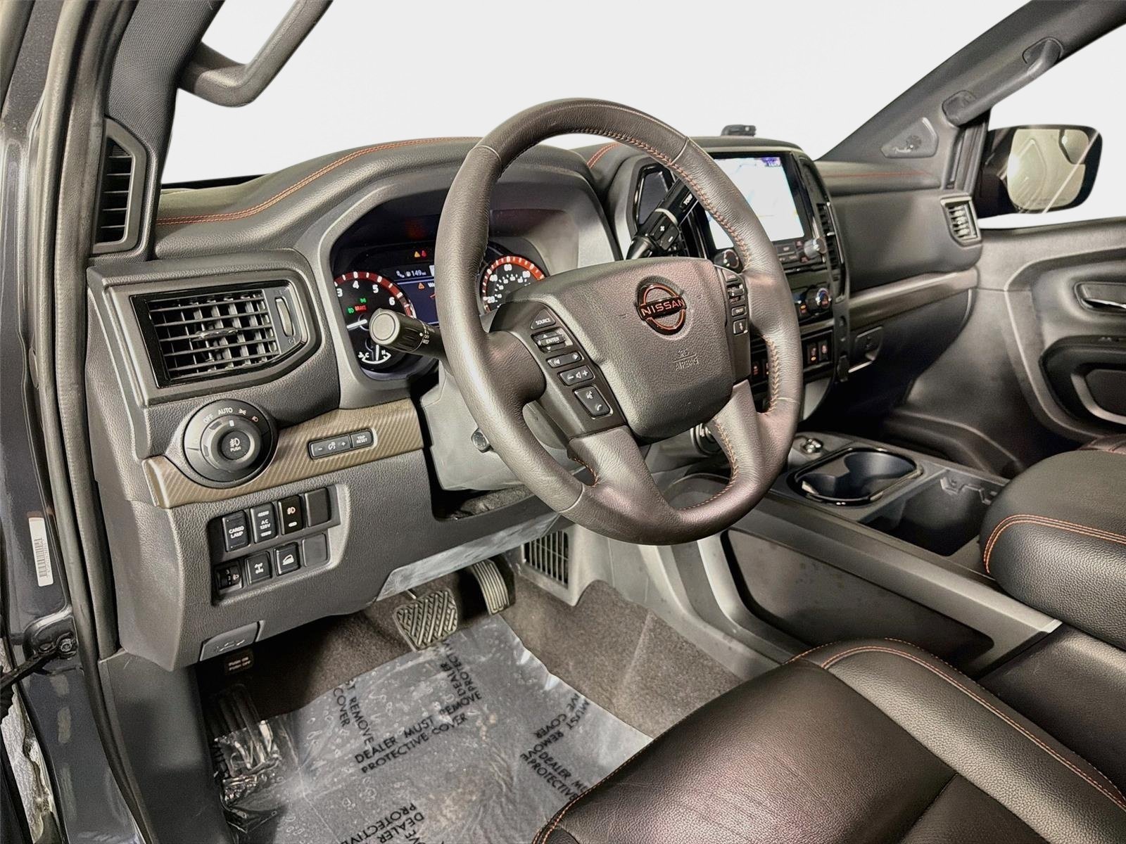 Used 2024 Gun Metallic Nissan PRO-4X image 9