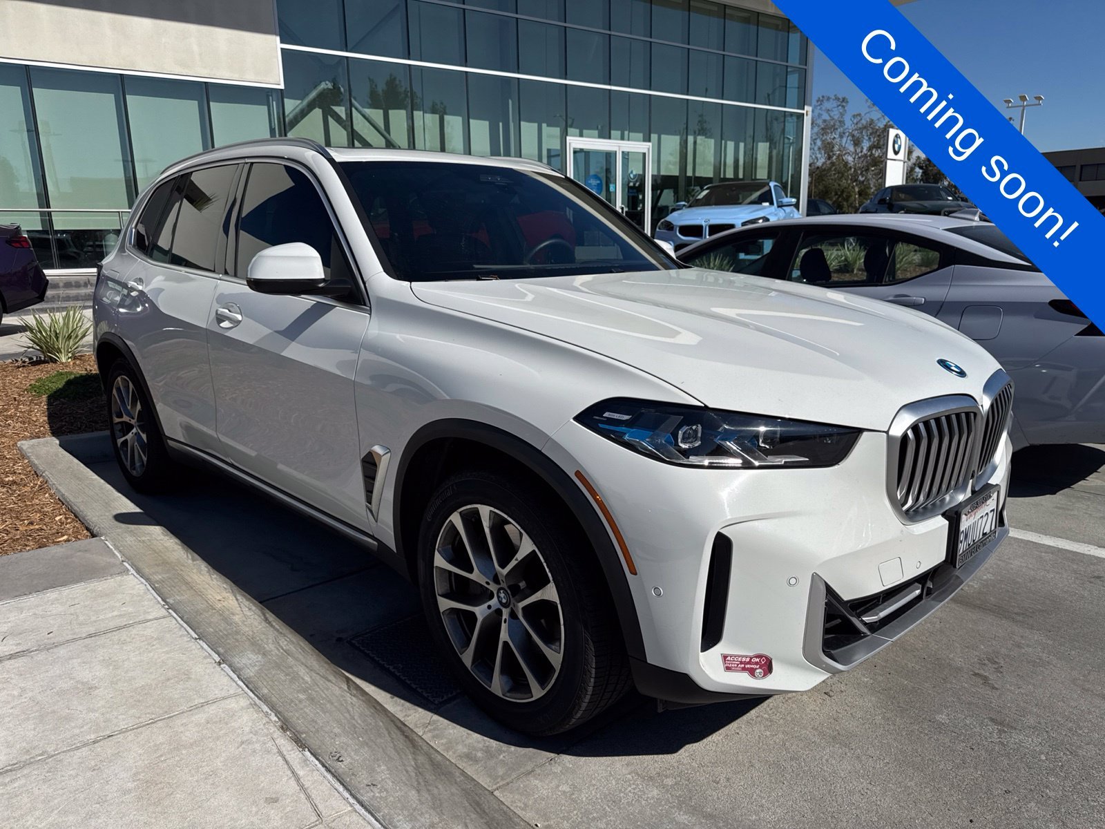Certified Used 2025 White BMW xDrive50e image 1