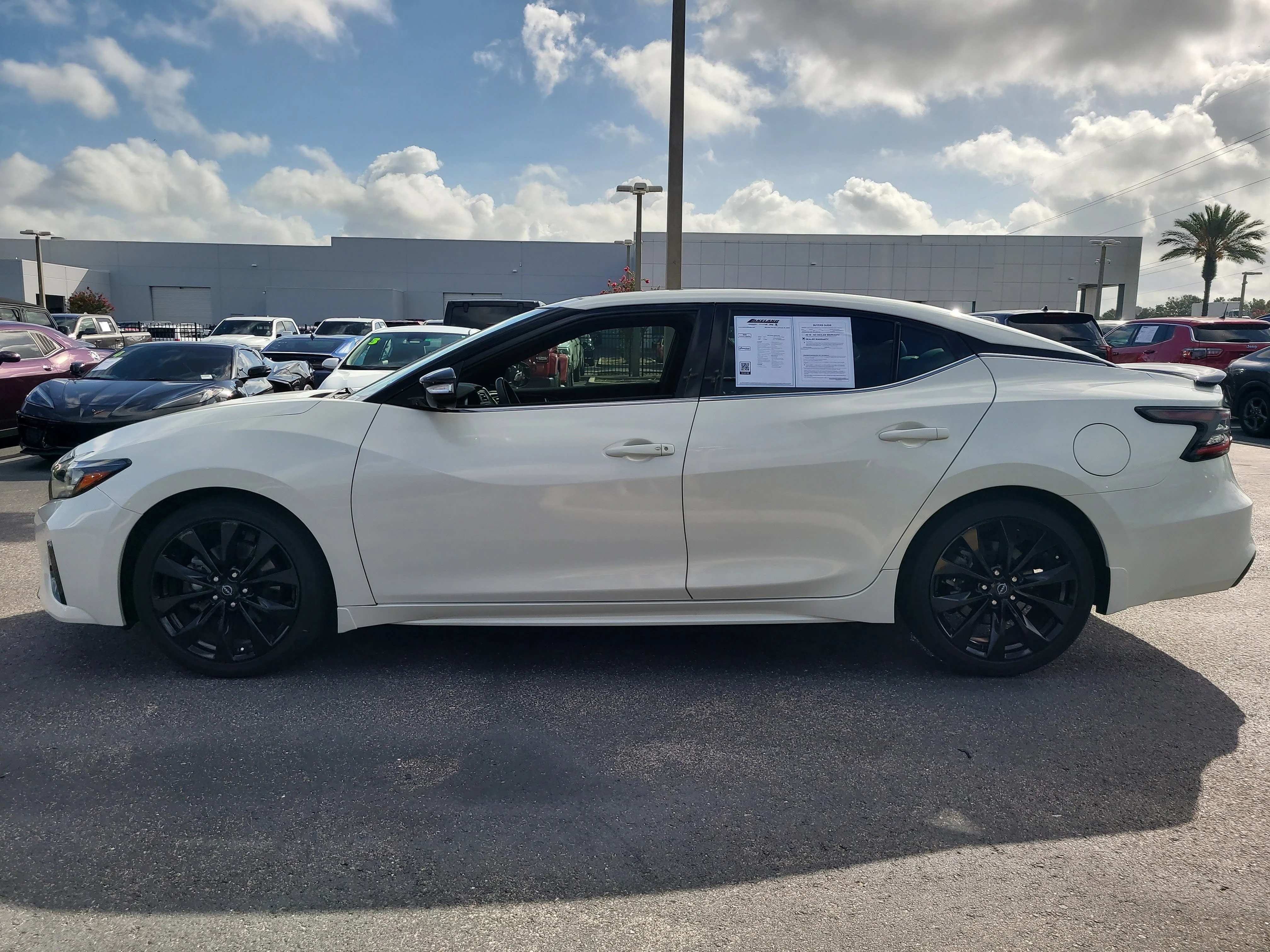 Used 2023 Pearl White Tricoat Nissan SR image 7