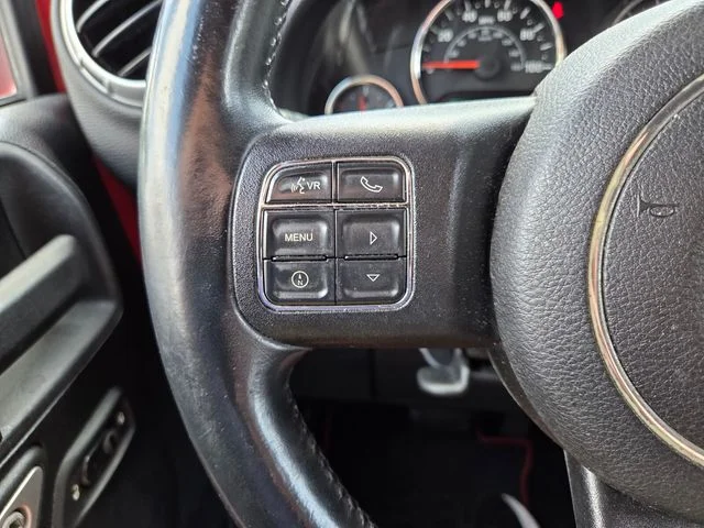 Used 2015 Red Jeep Unlimited Sahara image 29