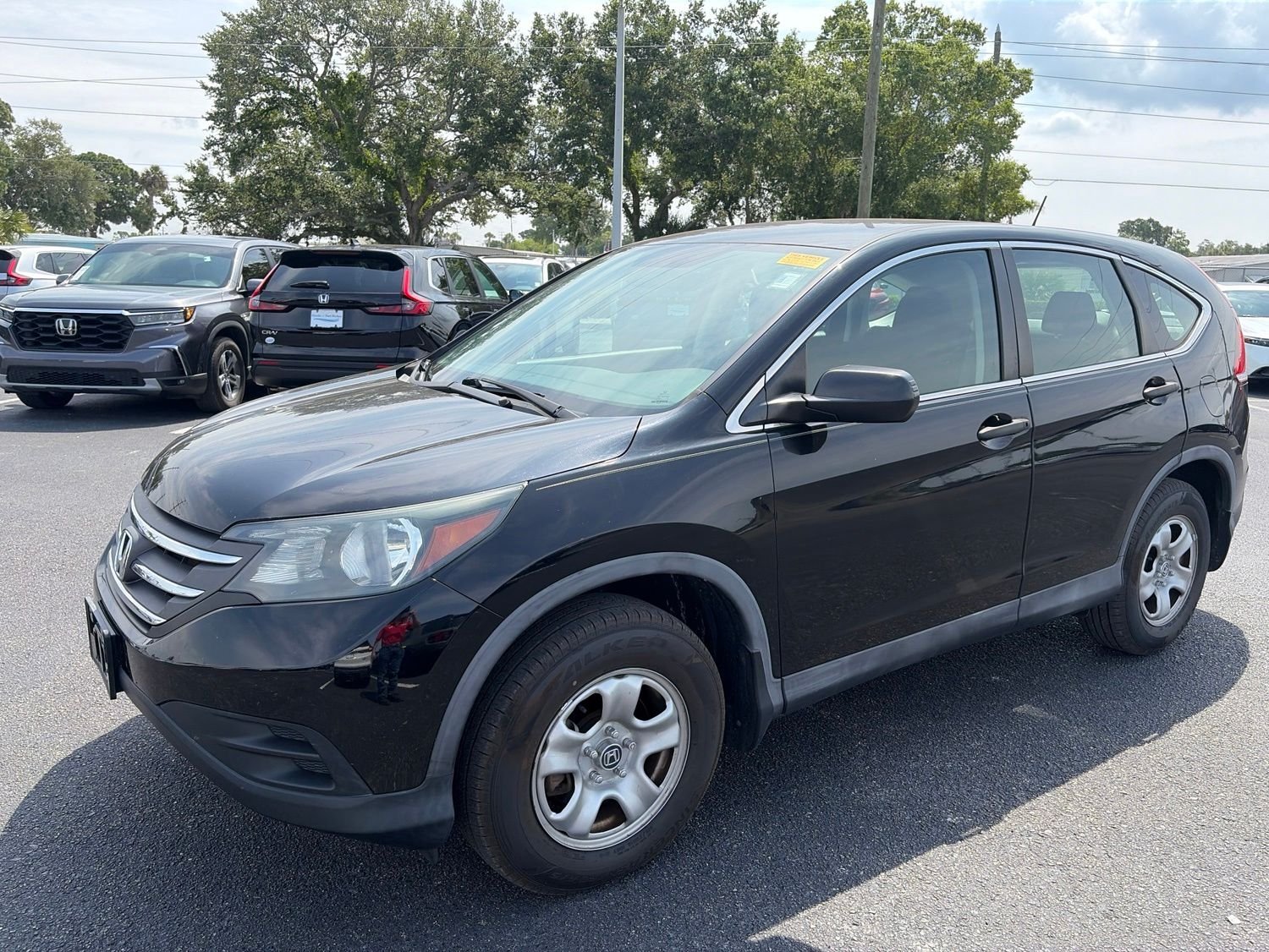Used 2014 Honda CR-V LX with VIN 3CZRM3H31EG708539 for sale in Port Richey, FL
