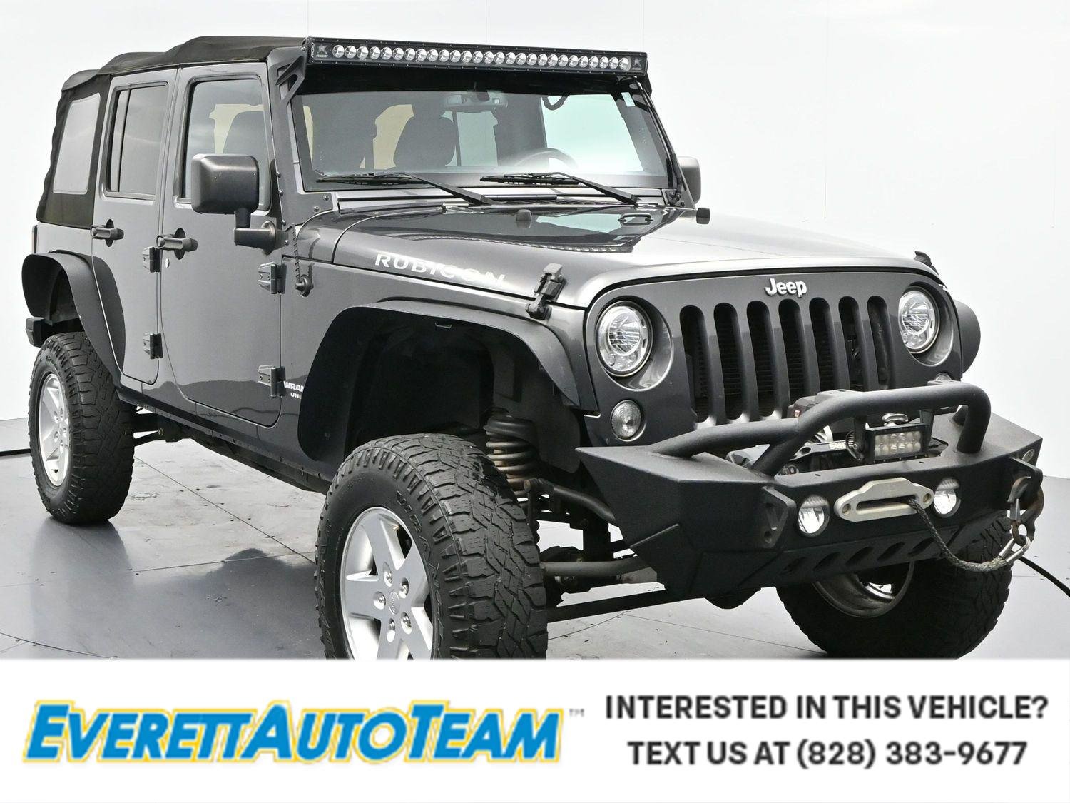 Used 2017 Granite Crystal Metallic Clearcoat Jeep Rubicon image 1