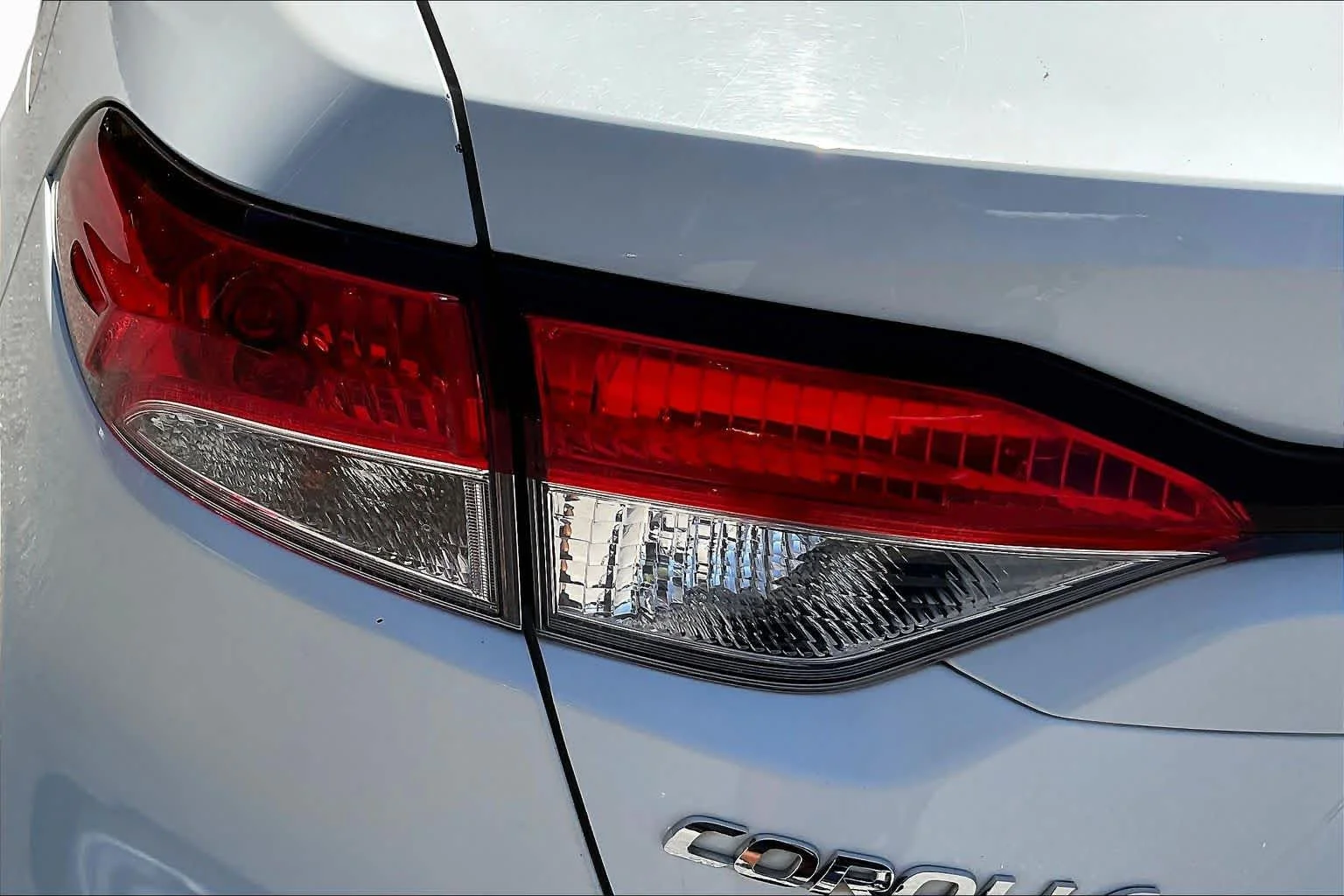 Used 2021 Super White Toyota LE image 28