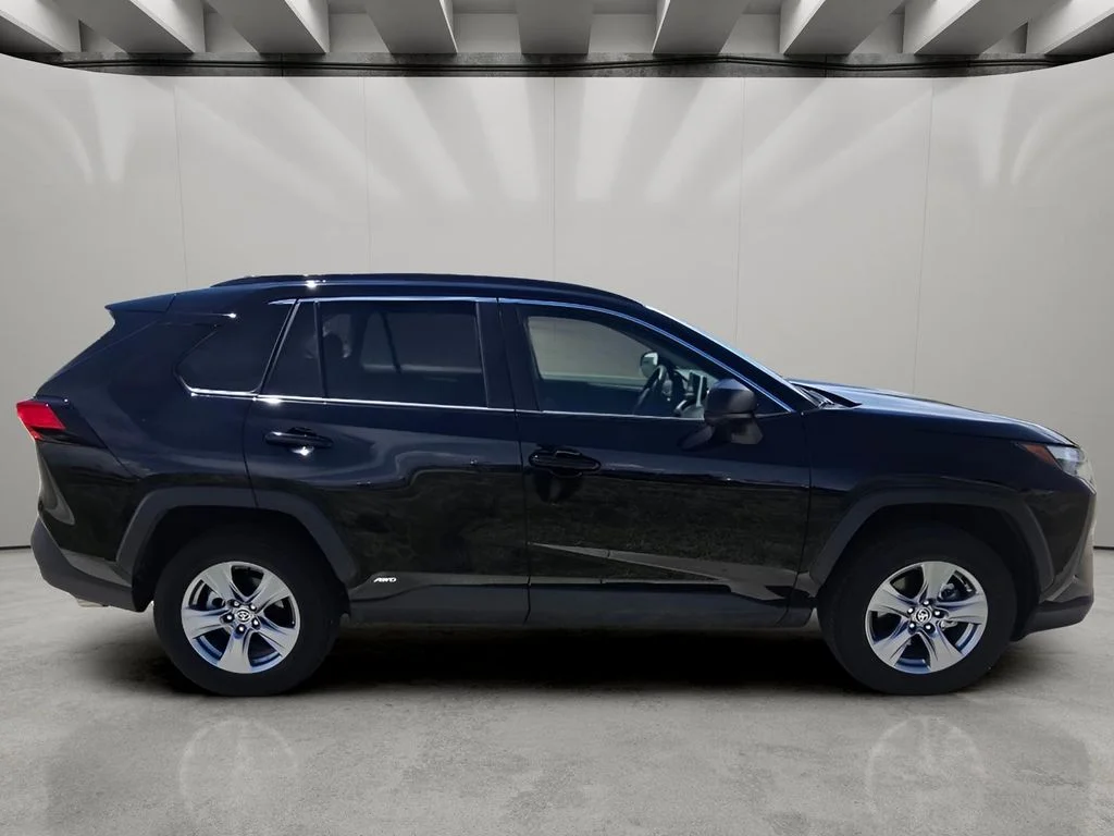 Used 2025 Midnight Black Metallic Toyota Hybrid LE image 6