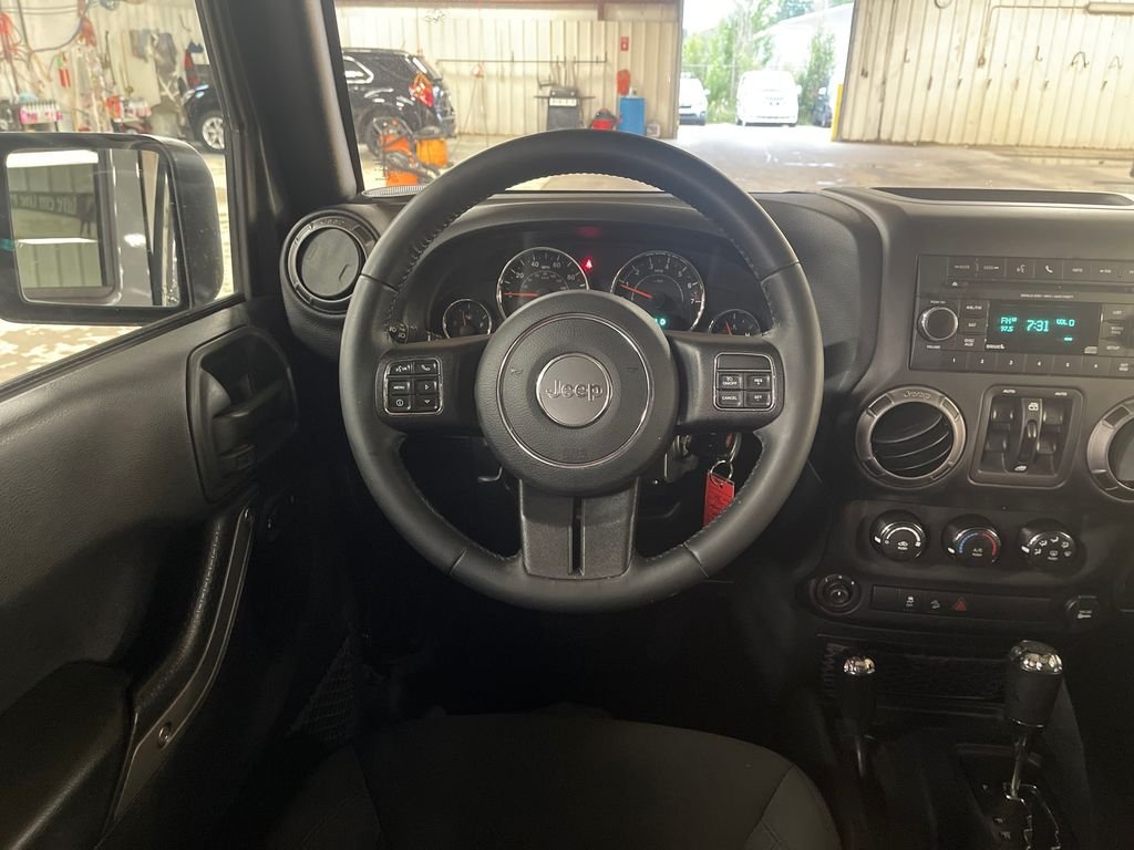Used 2018 Gray Jeep Unlimited Sport image 17