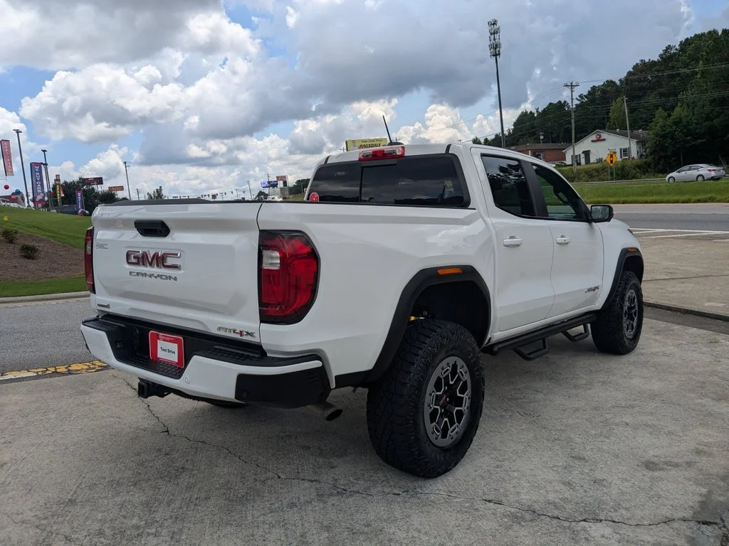 Used 2023 Summit White GMC 4WD AT4X image 5
