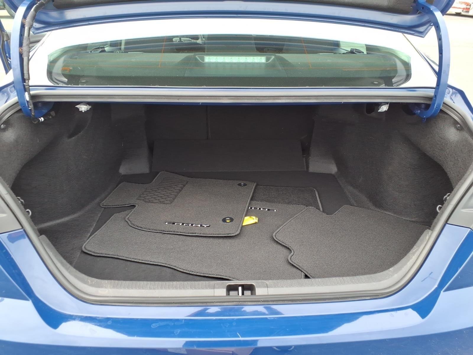 Used 2025 Reservoir Blue Toyota LE image 29