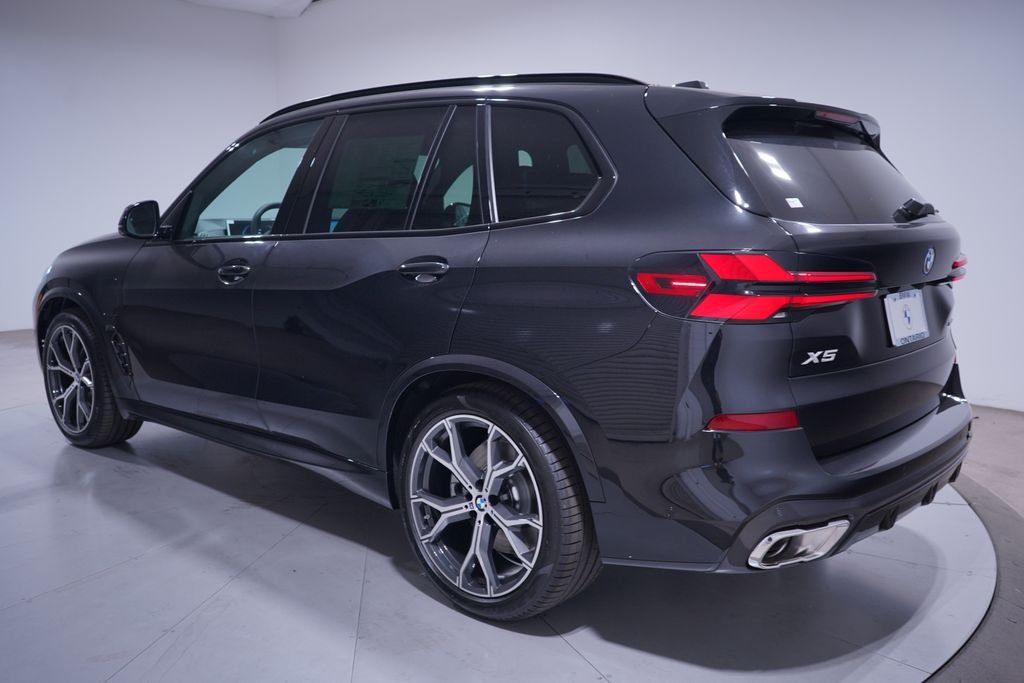 New 2026 Black Sapphire Metallic BMW xDrive50e image 3