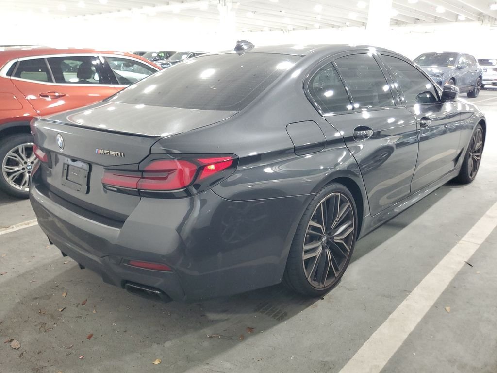 Certified Used 2023 Dark Graphite BMW M550i xDrive image 3