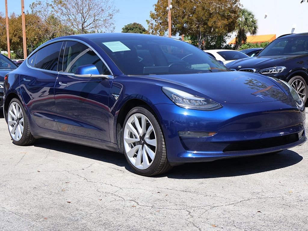 Used 2019 Tesla Model 3 Mid Range with VIN 5YJ3E1EA3KF326966 for sale in Miami, FL