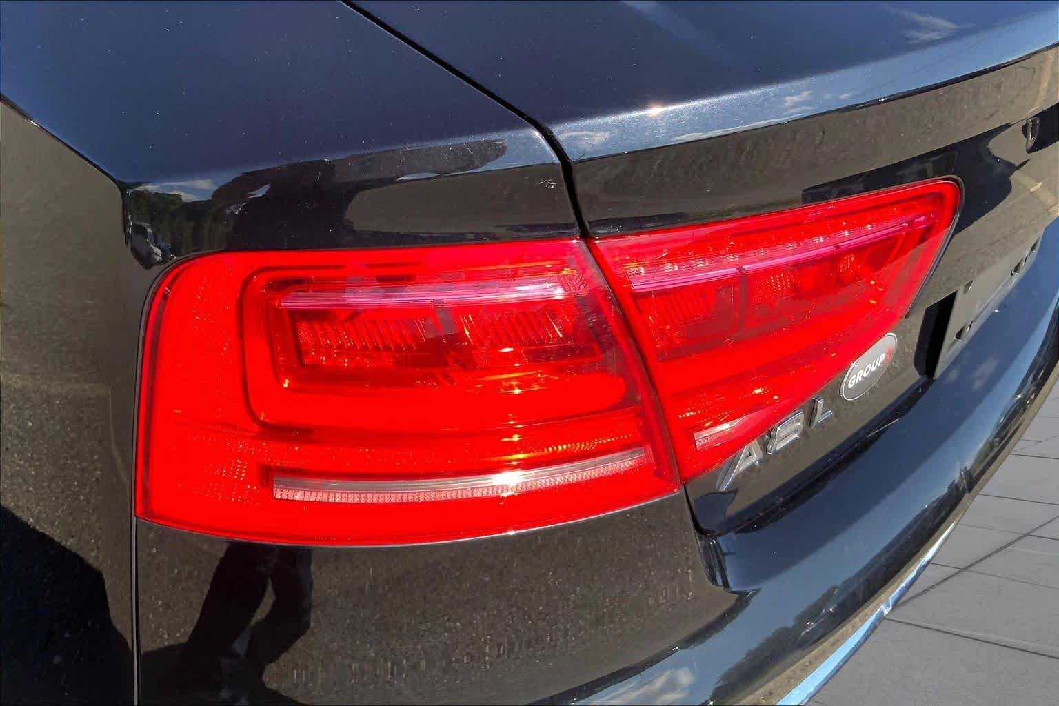 Used 2012 Emerald Black Metallic Audi  image 28